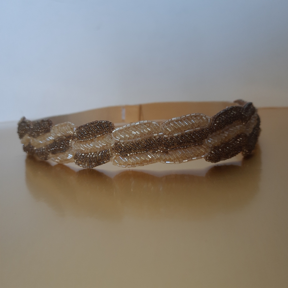 women's beaded belt with elastic band and button clasp